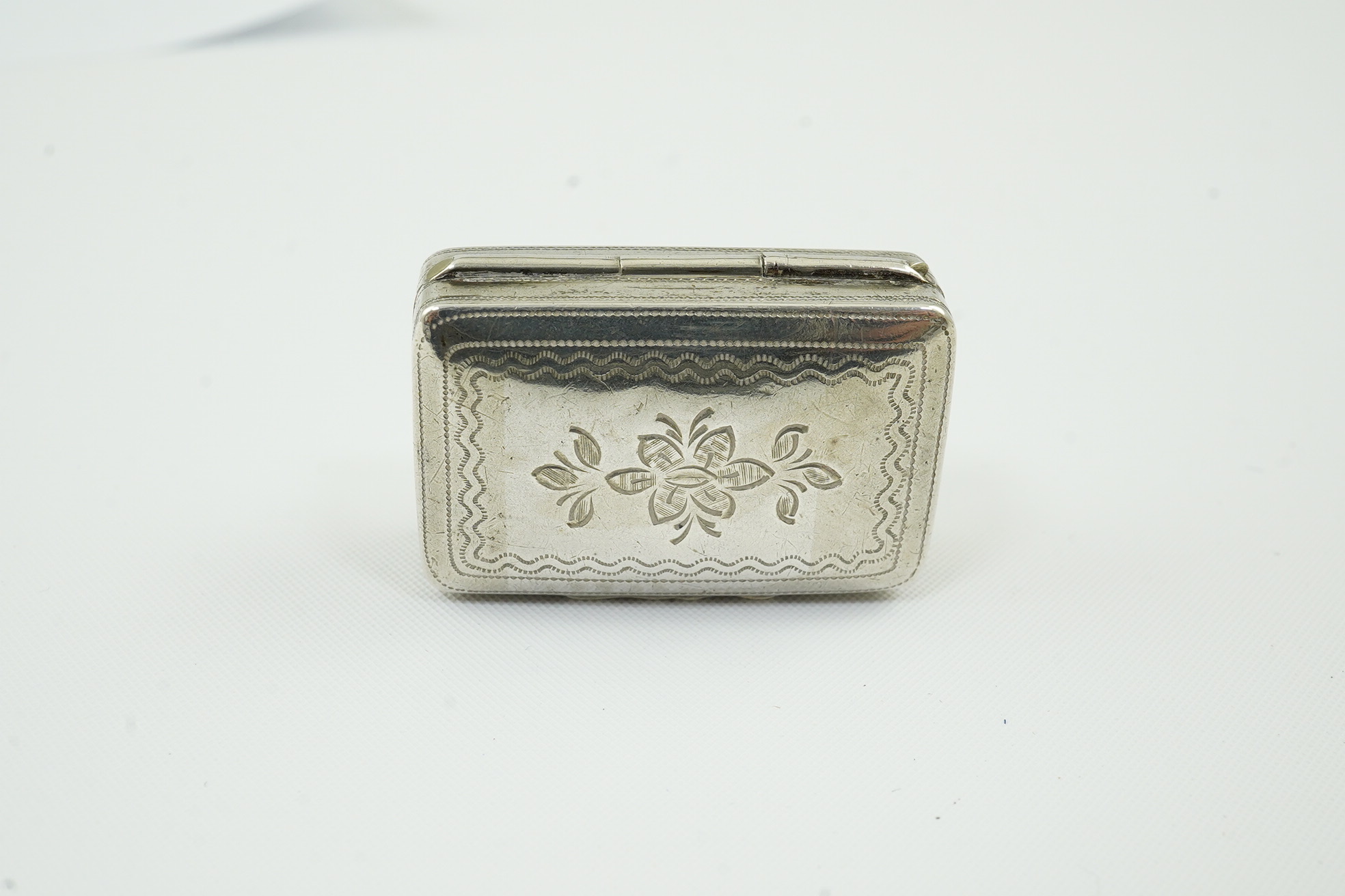 An early George IV silver rectangular vinaigrette, by Simpson & Son